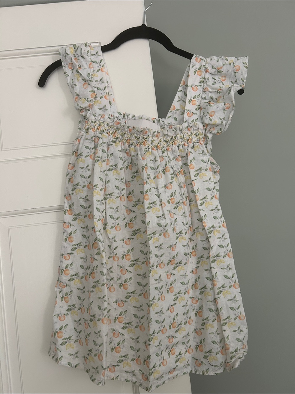 Dondolo women’s smocked citrus top